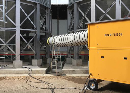 Installing a grain cooling unit in a high-heat region